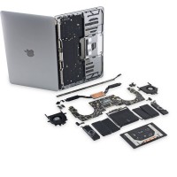 Le dmontage du MacBook Pro par iFixit rvle des grilles d'enceintes inutiles et une Touch bar difficile  remplacer.(Crdit iFixit)
